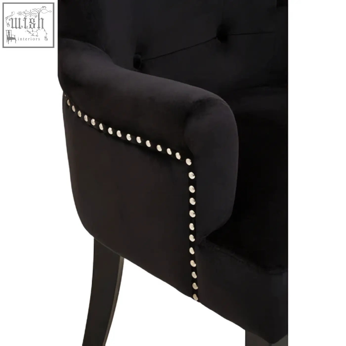 Black velvet dining chair with silver nailhead trim and ring back perfect for stylish dining rooms