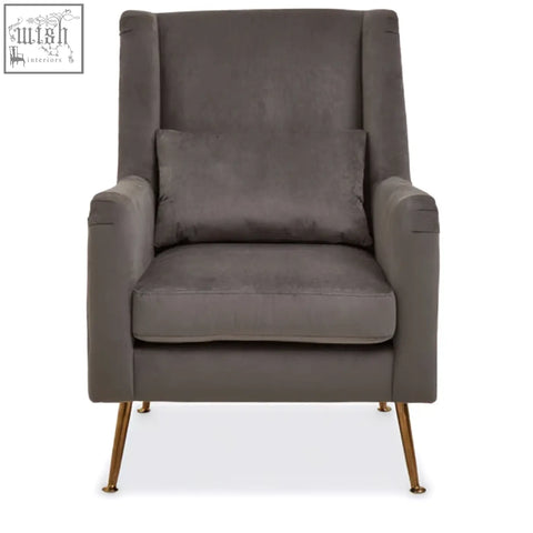 Gray velvet doucet chair with gold finish legs and sleek gold-tone metal frame for stylish seating