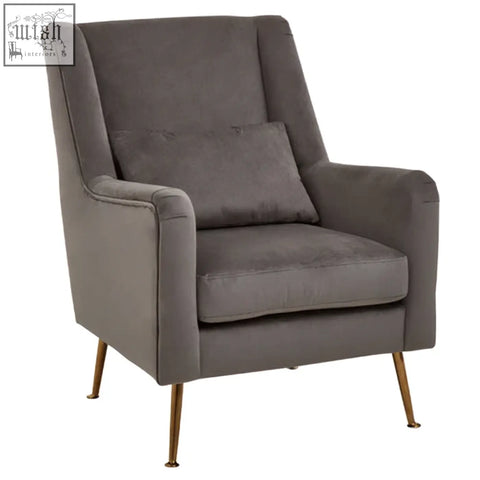 Gray velvet armchair with tufted back and stylish gold finish legs perfect for modern living spaces