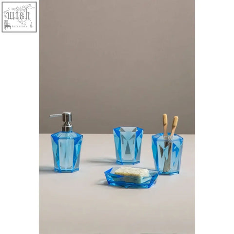 Dow blue acrylic toothbrush holder set with blue geometric glass and metallic pump and toothbrush holders