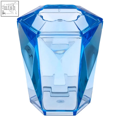 Dow blue acrylic toothbrush holder with blue translucent diamond shape and clear geometric facets for bathroom use