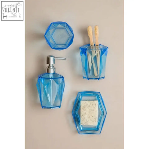 Dow blue acrylic bathroom set with tapered construction including pump dispenser toothbrush holder and soap dish