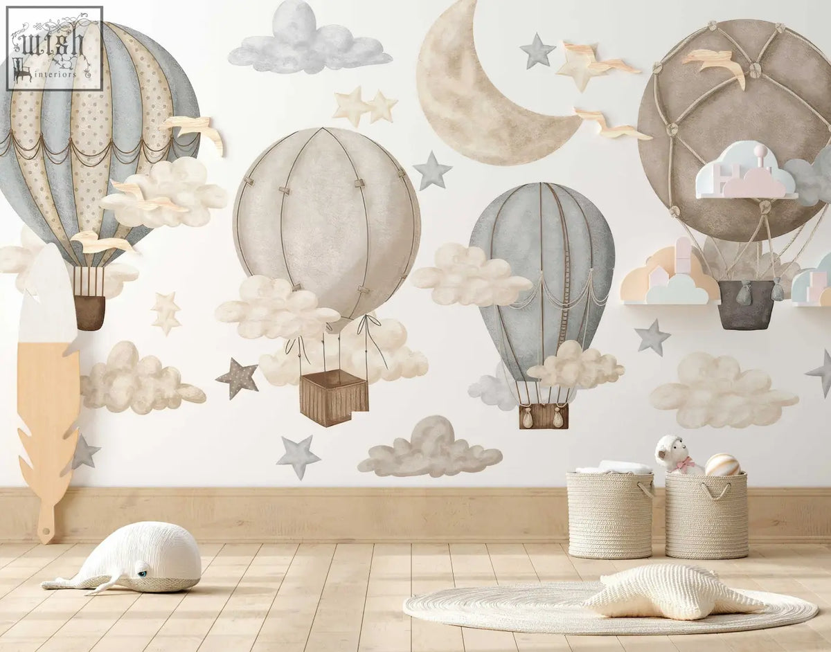 A whimsical dreamy hot air wall decal with soft blue beige and gray hot air balloons for nursery and kids room