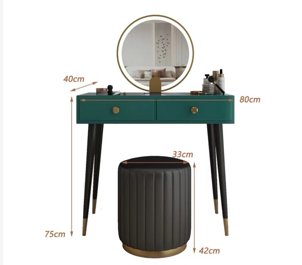 Teal green drew dressing table with gold-finished legs and round led mirror for stylish vanity setup