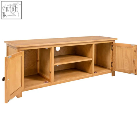 Light oak wood tv cabinet dros oakwood 110cm with two open compartments showing shelved interior storage