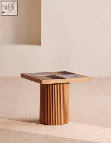 Dsouza square side table combines solid wood fluted pedestal base with a mosaic tabletop of wood and marble inlays offer financing