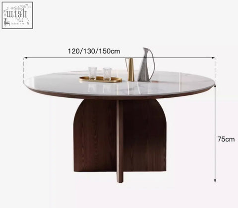 Modern round dunlap dining table with white marble top and dark wood curved legs in sintered stone finish