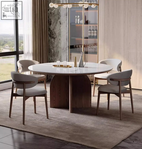 Modern round dunlap dining table with white marble top and dark wood base perfect for stylish dining spaces