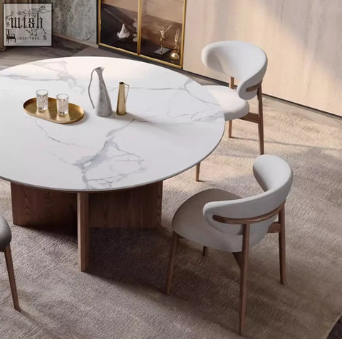 Round white marble dunlap dining table with wooden base and matching chairs made of sintered stone