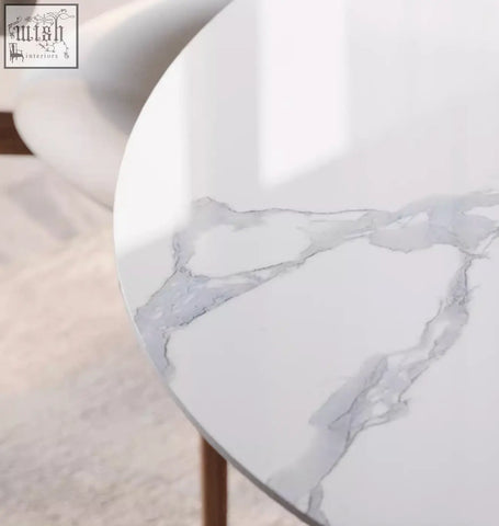 White marble effect tabletop with subtle gray veining on dunlap dining table sintered stone surface