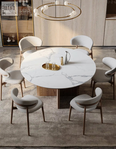 White marble dunlap dining table with sleek modern design and dark wood legs made of sintered stone