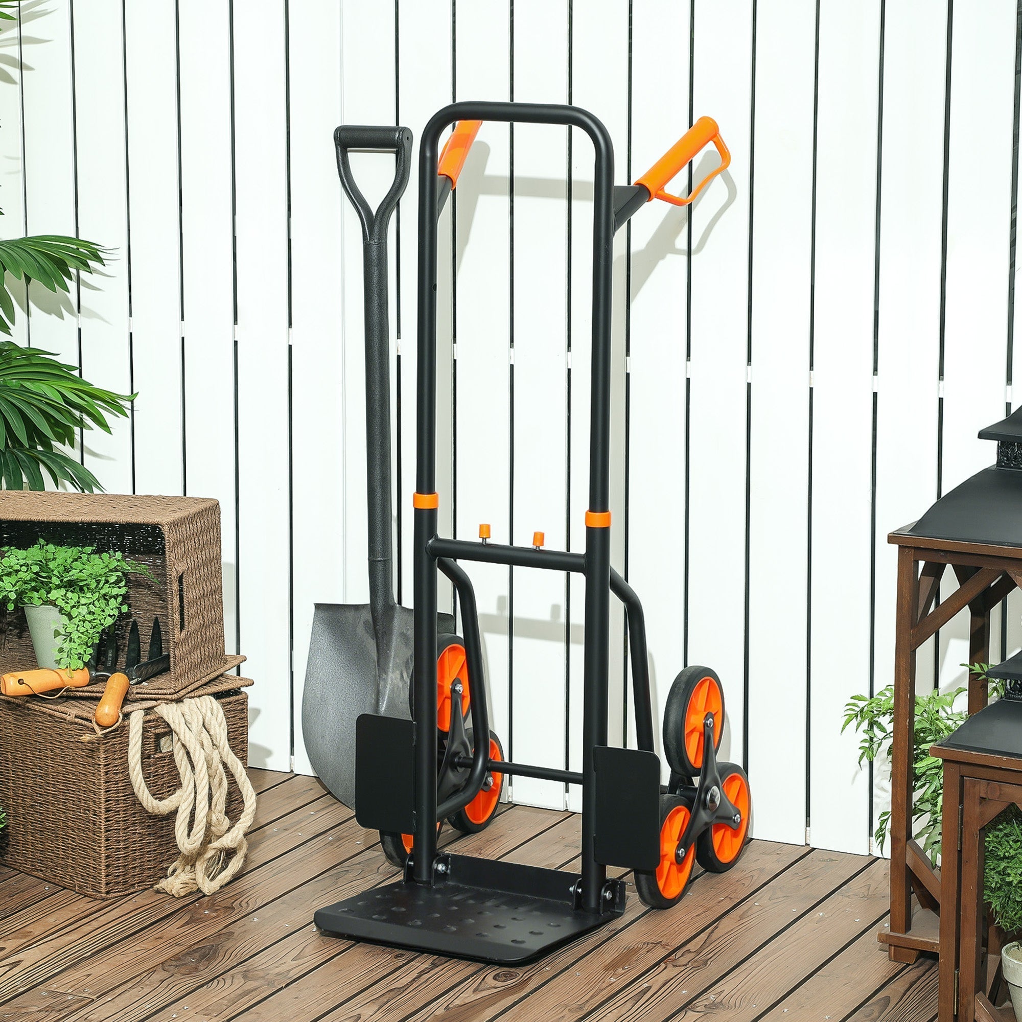 Durhand six-wheel folding sack barrow trolley in black and orange with textured skid chassis for moving multiple boxes