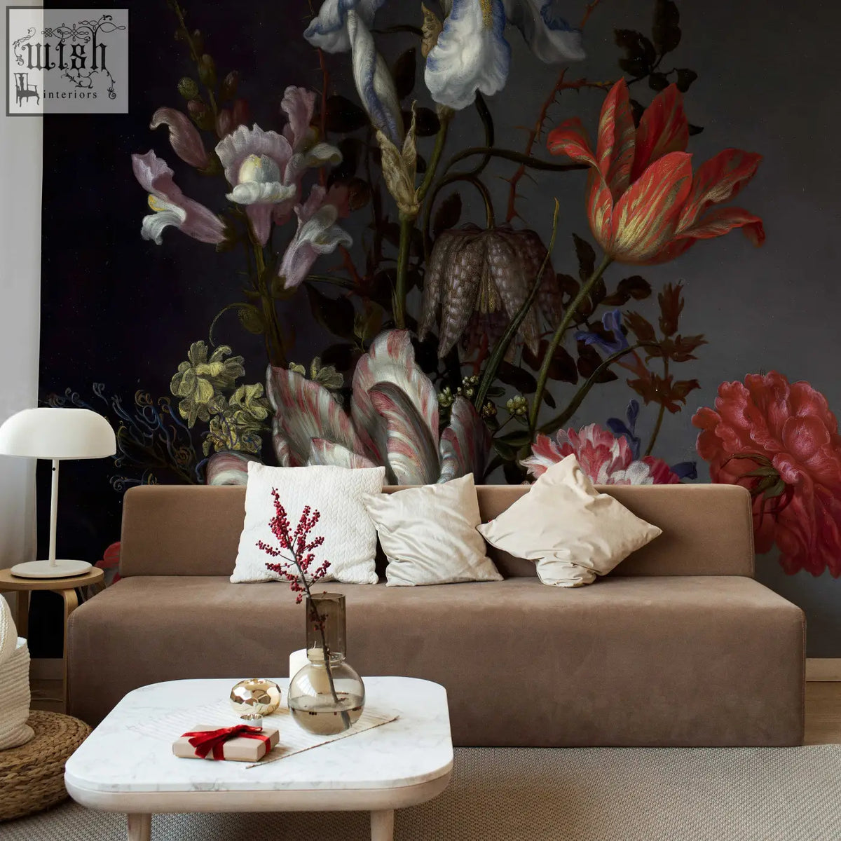 Brown velvet sofa with white and cream pillows in living space featuring dutch dark classic floral peel and stick wallpaper by contact clickwalls