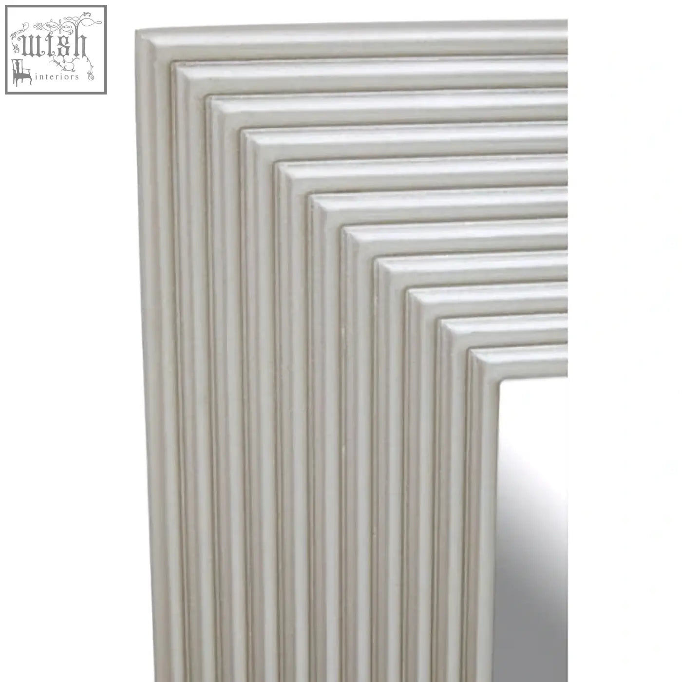 A sleek off-white framed silver wall mirror with a modern ribbed design perfect for stylish wall decor