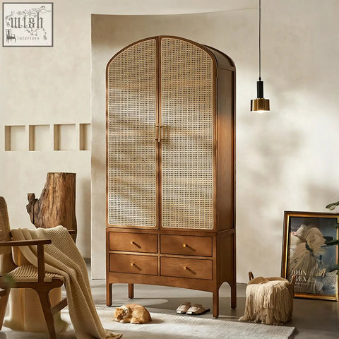 A tall dylan rattan wardrobe with arched wooden frame woven cane panels and four drawers perfect for easy cleaning with a damp cloth