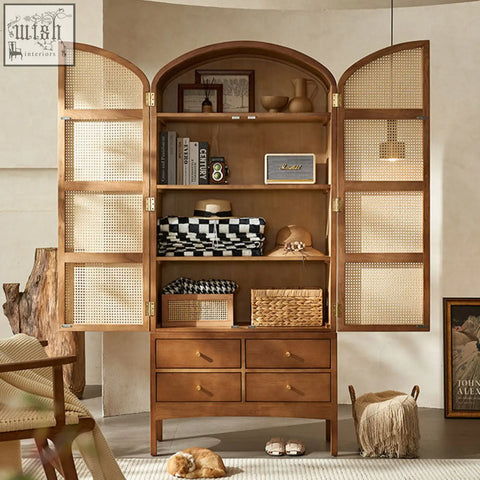 A warm-toned wooden dylan rattan wardrobe with cane-paneled doors showing books and woven baskets use a damp cloth for cleaning