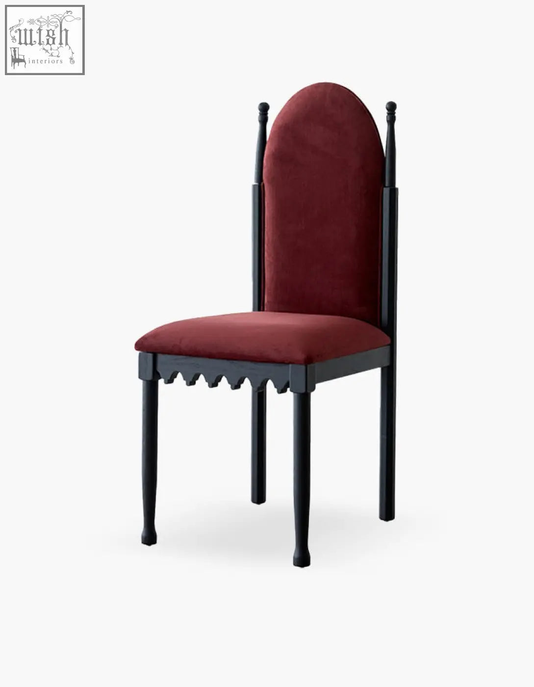 A striking ealing high-back dining chair with black frame and deep red velvet seat and backrest