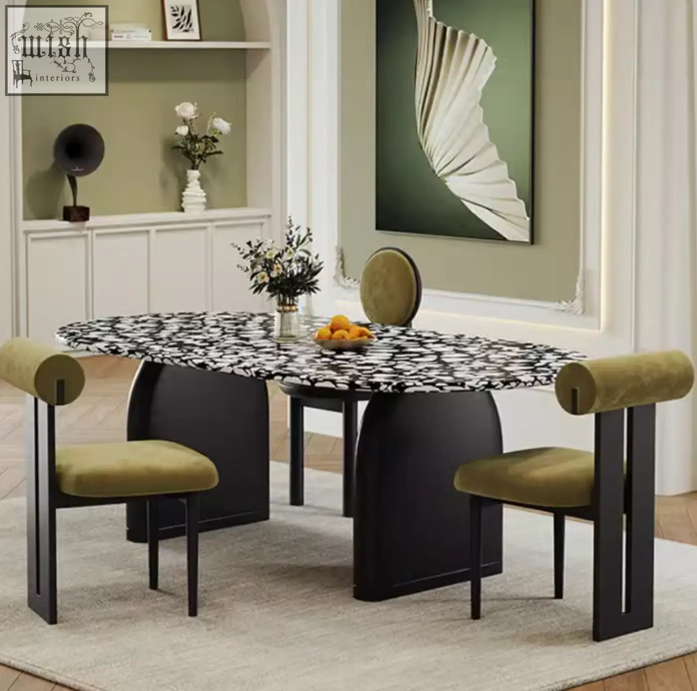 Modern oval eaton black dining table with black and white marble terrazzo top and sleek curved legs