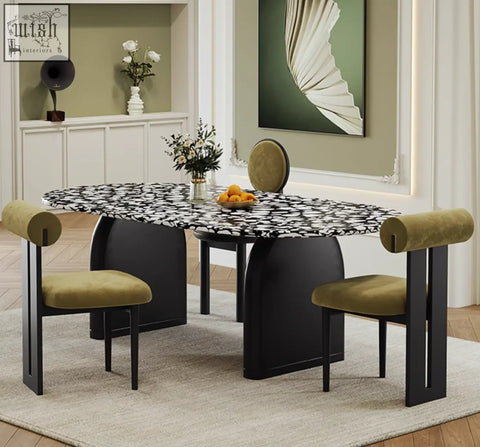 Eaton black dining table with black and white marble patterned top and sleek curved black legs perfect for dining room
