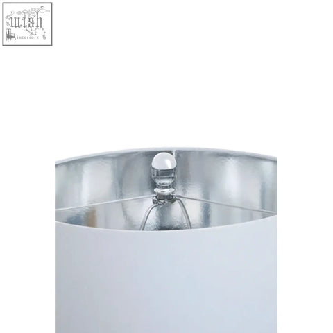 Silver finished lamp base with smooth cylindrical design and reflective surface for eben marble base table lamp with ivory shade