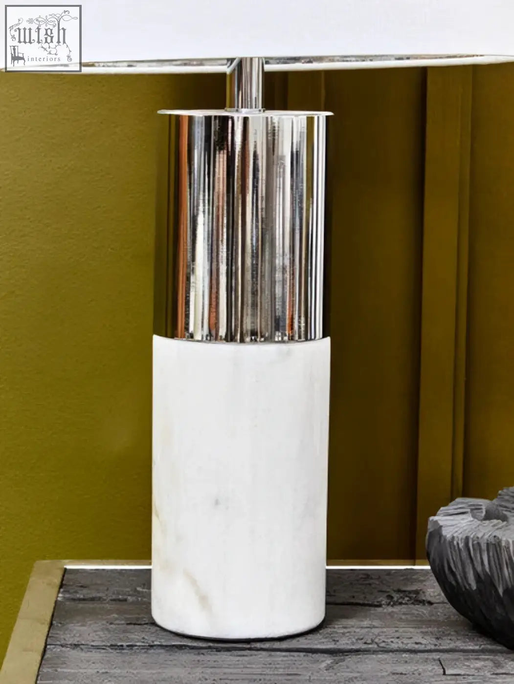 Ebene marble base table lamp with ivory shade featuring a sleek polished chrome top and white marble base