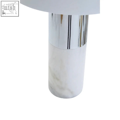 Eben marble base table lamp with white marble base and polished chrome accent supporting an ivory shade