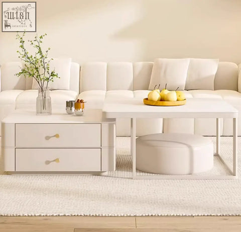 White modern eclipse nesting coffee table with two drawers gold-tone handles and sleek metal frame in cream