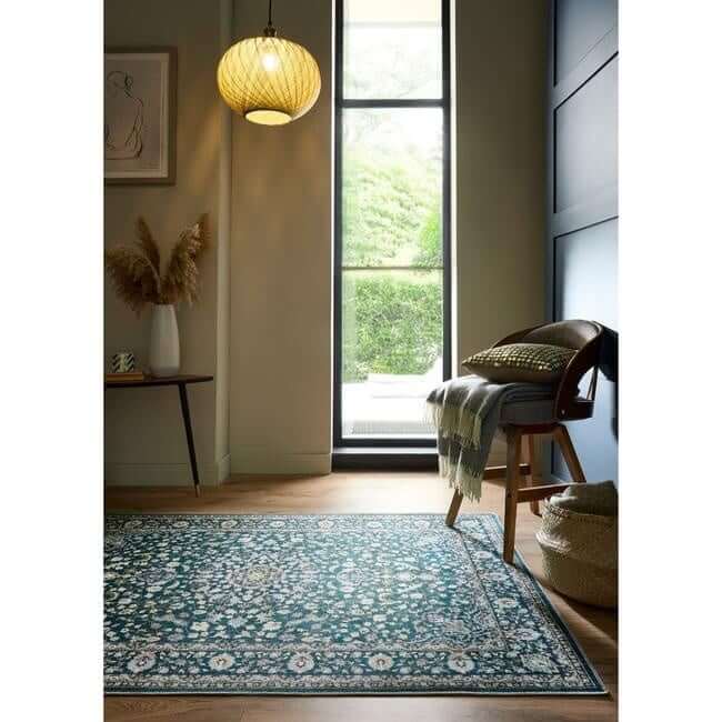 Teal and white eco-washable green rug with soft chenille and non-slip tpr backing featuring medallion design