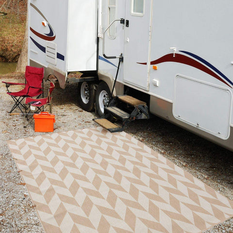 Beige and cream geometric patterned ecology outdoor rug with woven texture perfect for outdoor spaces