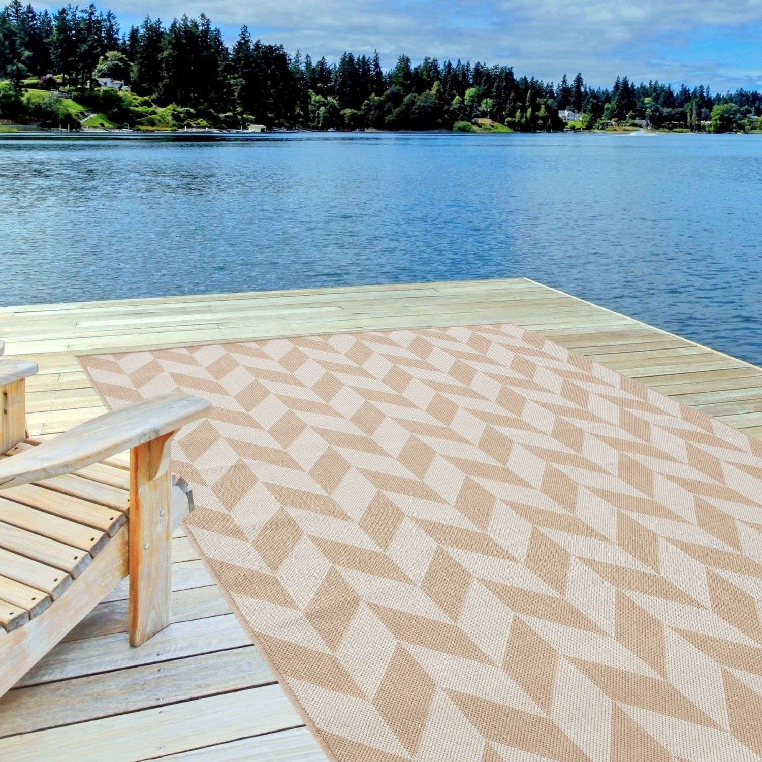 Beige and cream geometric-patterned ecology outdoor rug on a wooden deck perfect for outdoor use