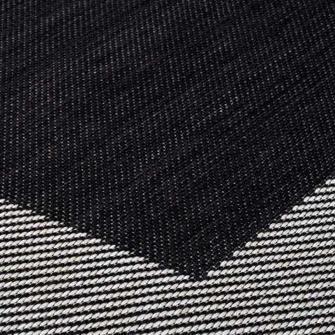 Black and white woven ecology outdoor rug with geometric pattern perfect as an outdoor rug black option