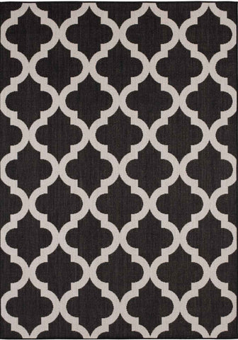 Black and cream geometric ecology outdoor rug with repeating quatrefoil design perfect as outdoor rug black