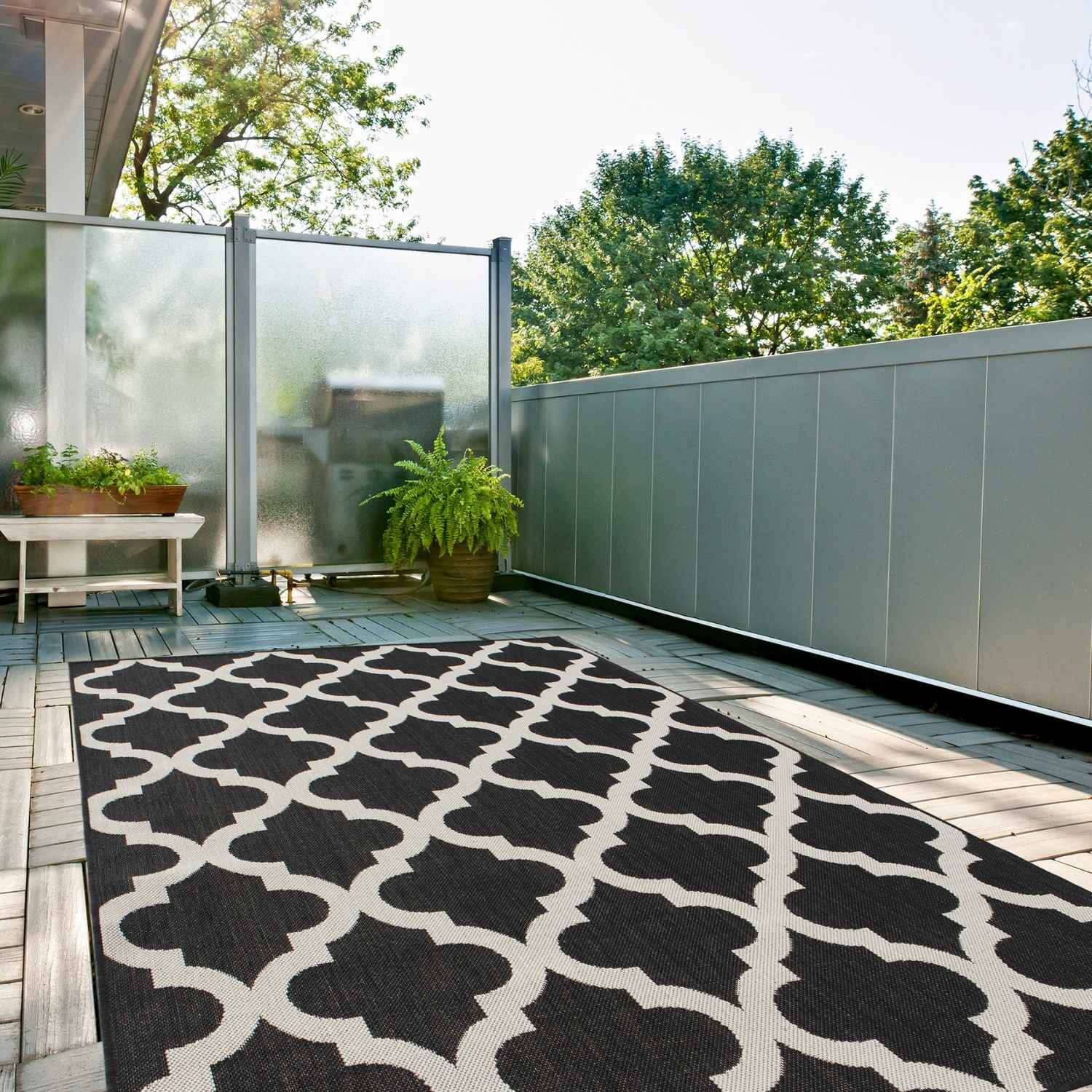 Ecology outdoor rug black featuring a bold black and white geometric pattern perfect for outdoor use