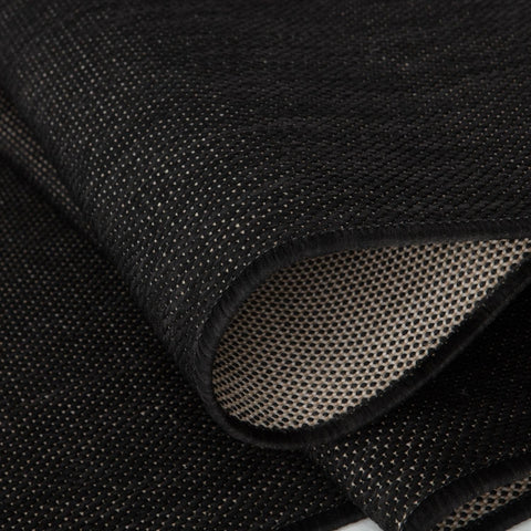 Black woven mesh ecology outdoor rug with textured breathable surface and reinforced edges outdoor rug black