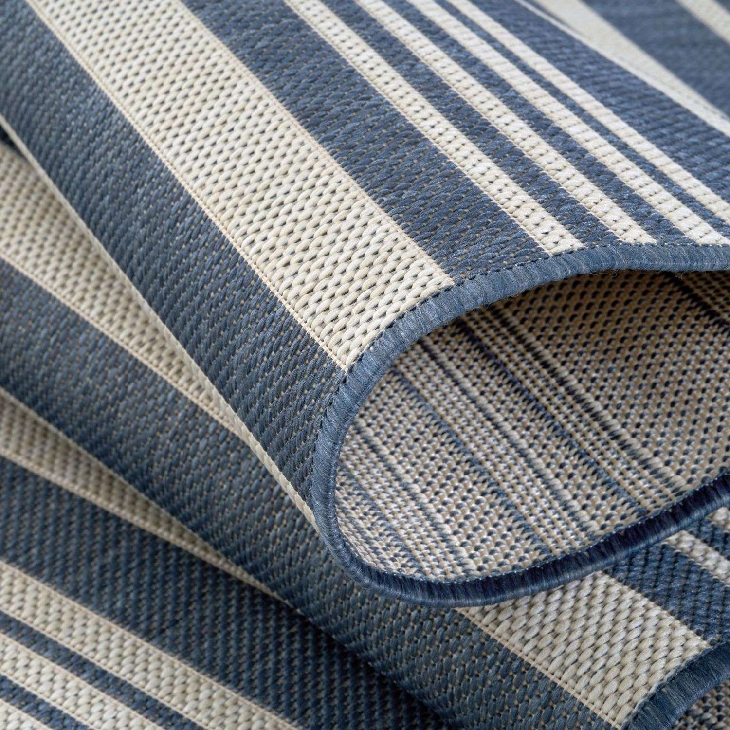 Blue and beige striped ecology outdoor rug with woven texture perfect for outdoor use outdoor rug blue