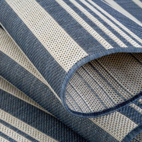Blue and beige striped ecology outdoor rug with woven texture perfect for outdoor use outdoor rug blue