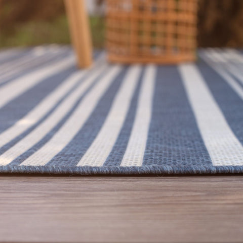 Ecology outdoor rug blue with woven texture and blue and white stripes perfect for outdoor use