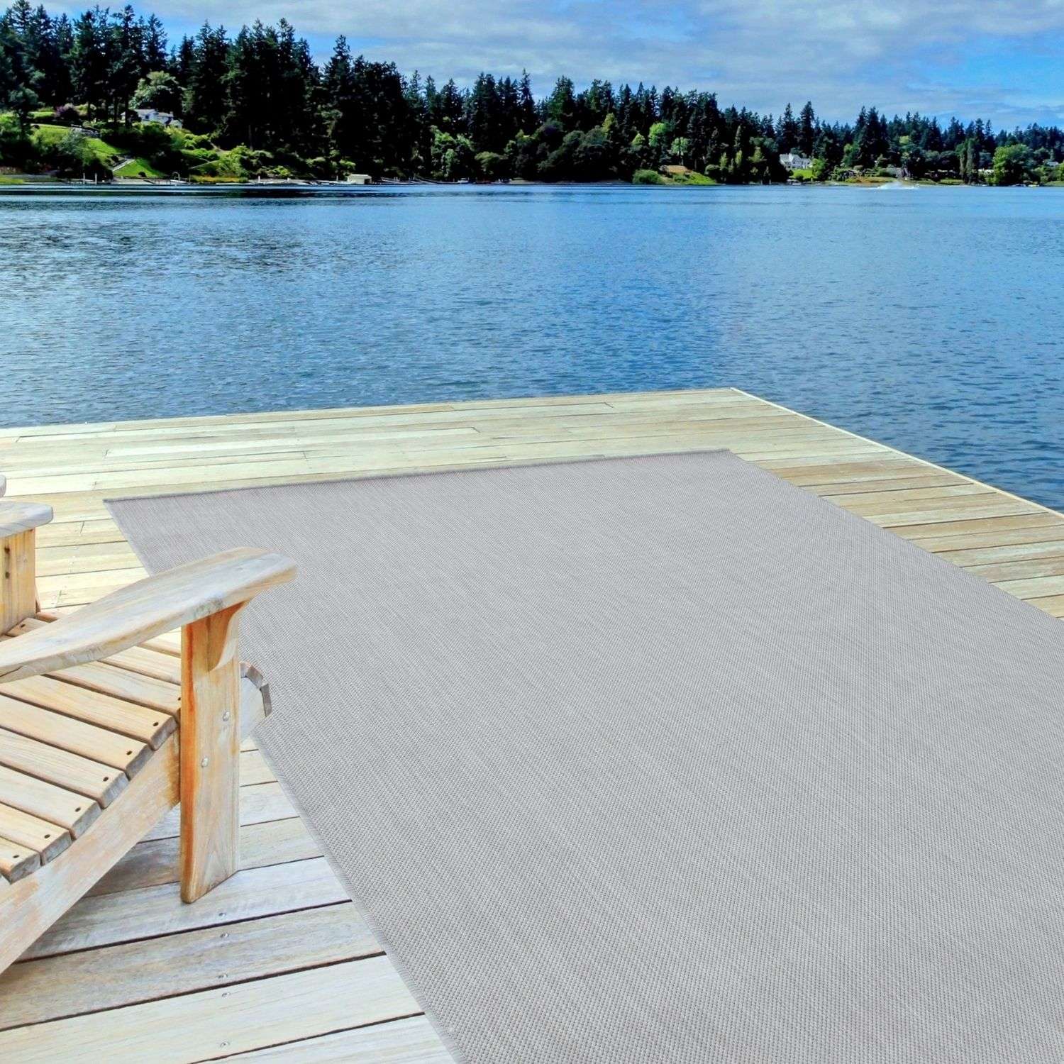 Beige woven ecology outdoor rug grey 500g made for outdoor use on a wooden dock
