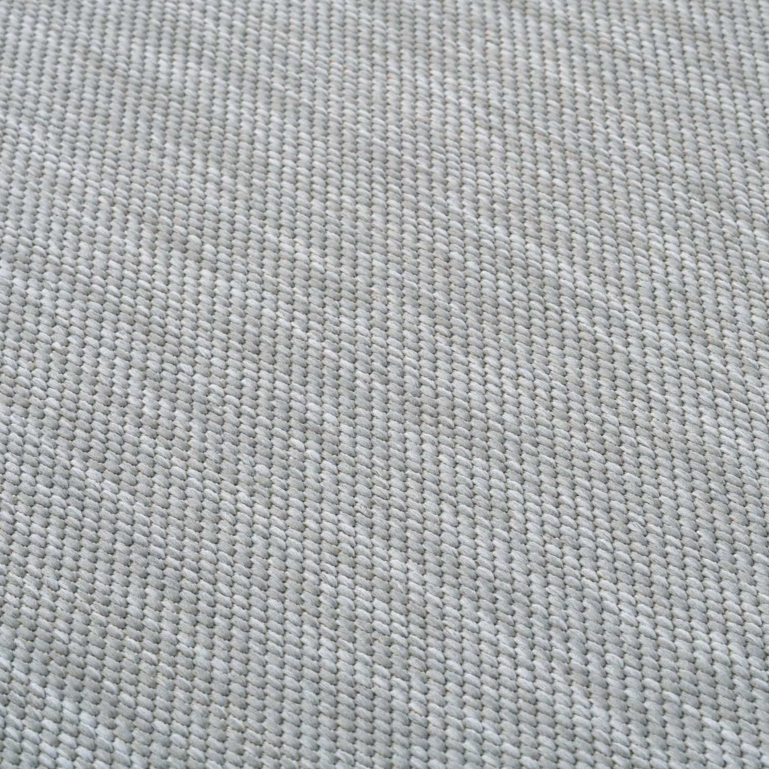 Light gray woven ecology outdoor rug with tight uniform knit pattern perfect for outdoor rug grey use