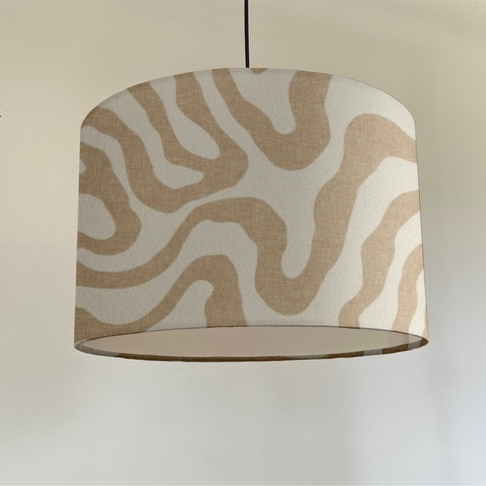 Ecru wiggle fabric drum ceiling shade with beige white wavy pattern and fitting sits 3-4cm white lining