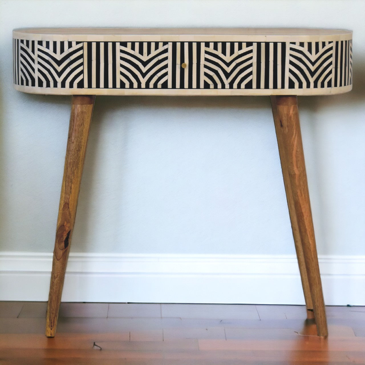 Edessa bone inlay console table with black and white geometric pattern on mango wood oval top and slim legs