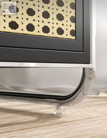 Black-framed edison clear acrylic side table with geometric panel and chrome-accented base for stylish living spaces