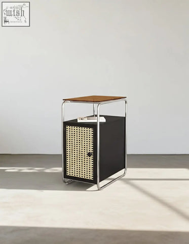 Black edison clear acrylic side table with warm wood top chrome frame and woven cane front panel