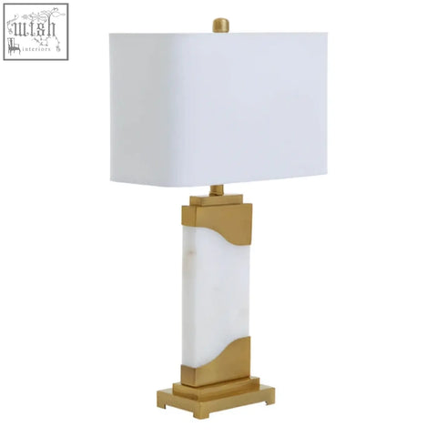 Edith table lamp with gold accents white marble base and white fabric shade perfect for stylish lighting