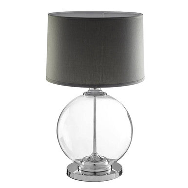 Edna glass table lamp with clear globe and sleek chrome base topped with a grey linen shade
