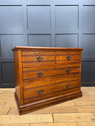 Antique edwardian walnut chest of drawers with five drawers brass handles and subtle wood grain detailing