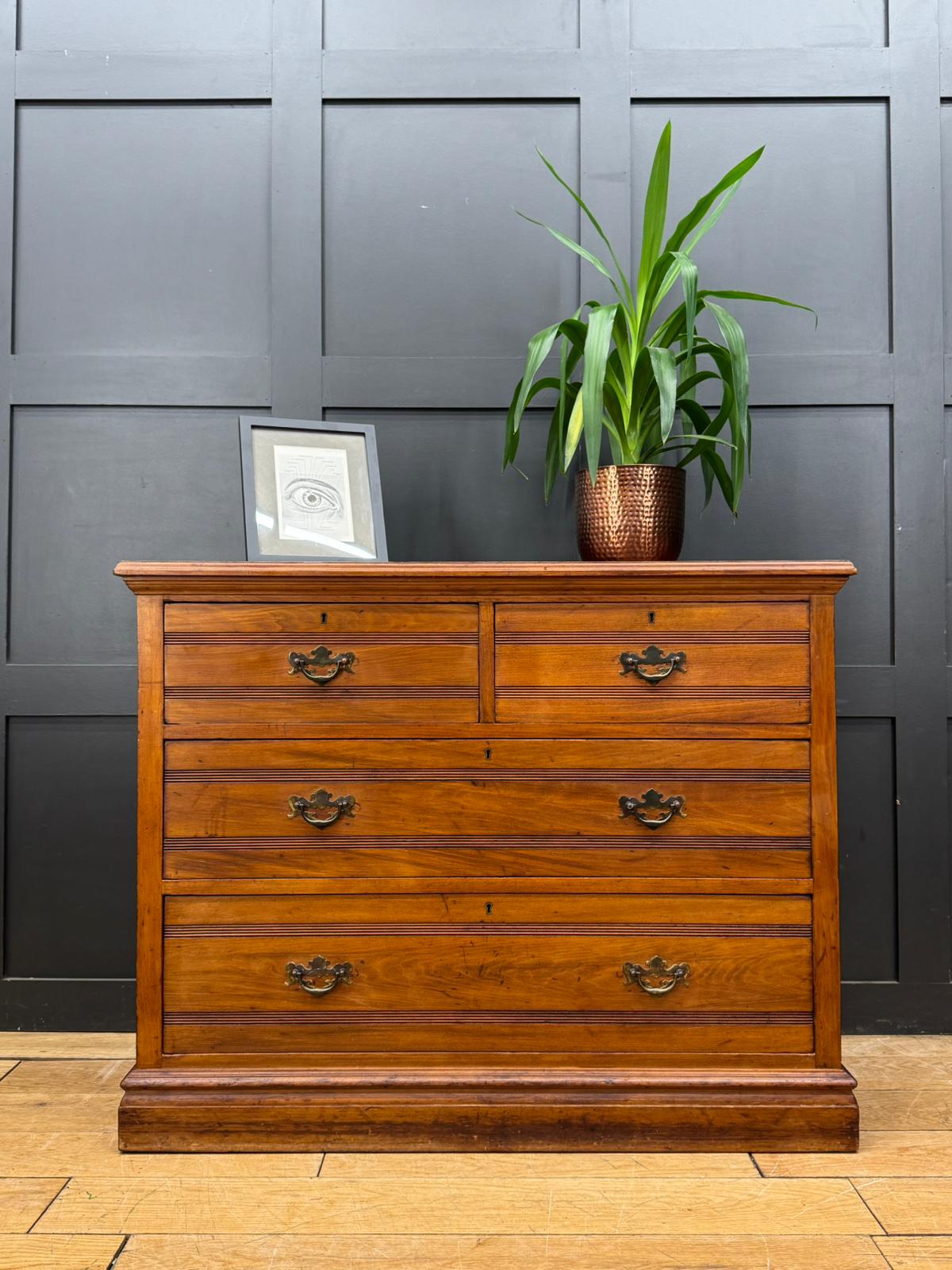 Edwardian walnut chest of drawers with five drawers dark brown finish and ornate brass handles for bedroom storage