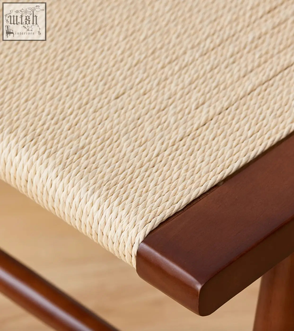 Beige woven rope seat dining chair with dark brown wooden frame in eenoch dining chair rattan design