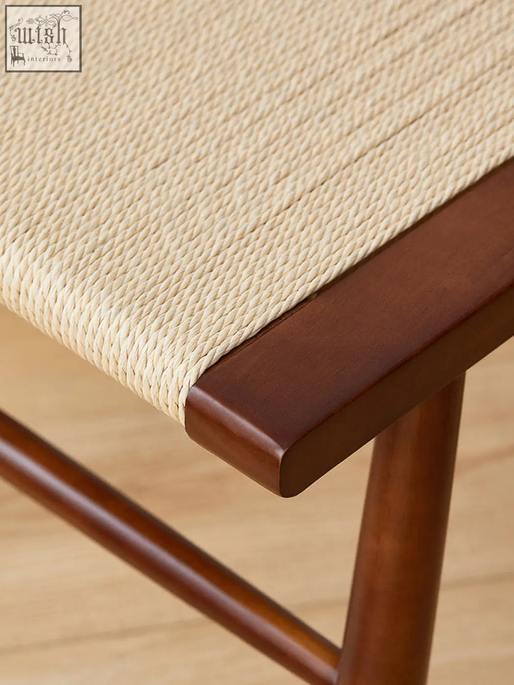 Beige woven rope seat with dark brown wooden frame on eenoch dining chair rattan perfect for dining room use