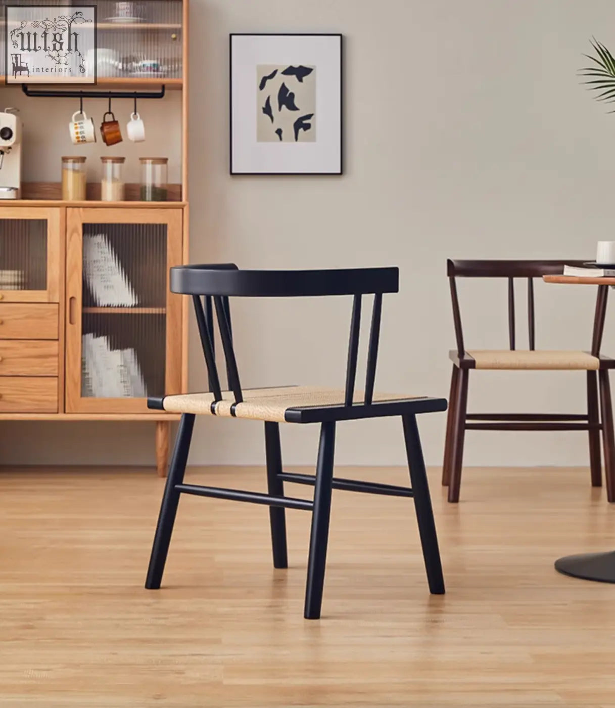 Black wooden eenoch dining chair with woven natural rattan seat perfect for stylish dining spaces